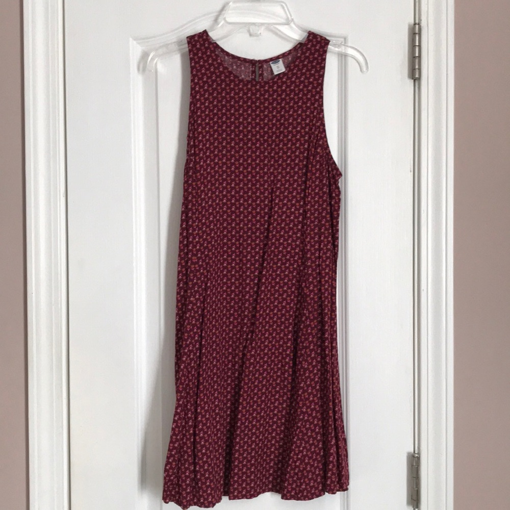 Short maroon dress with orange and pink flowers